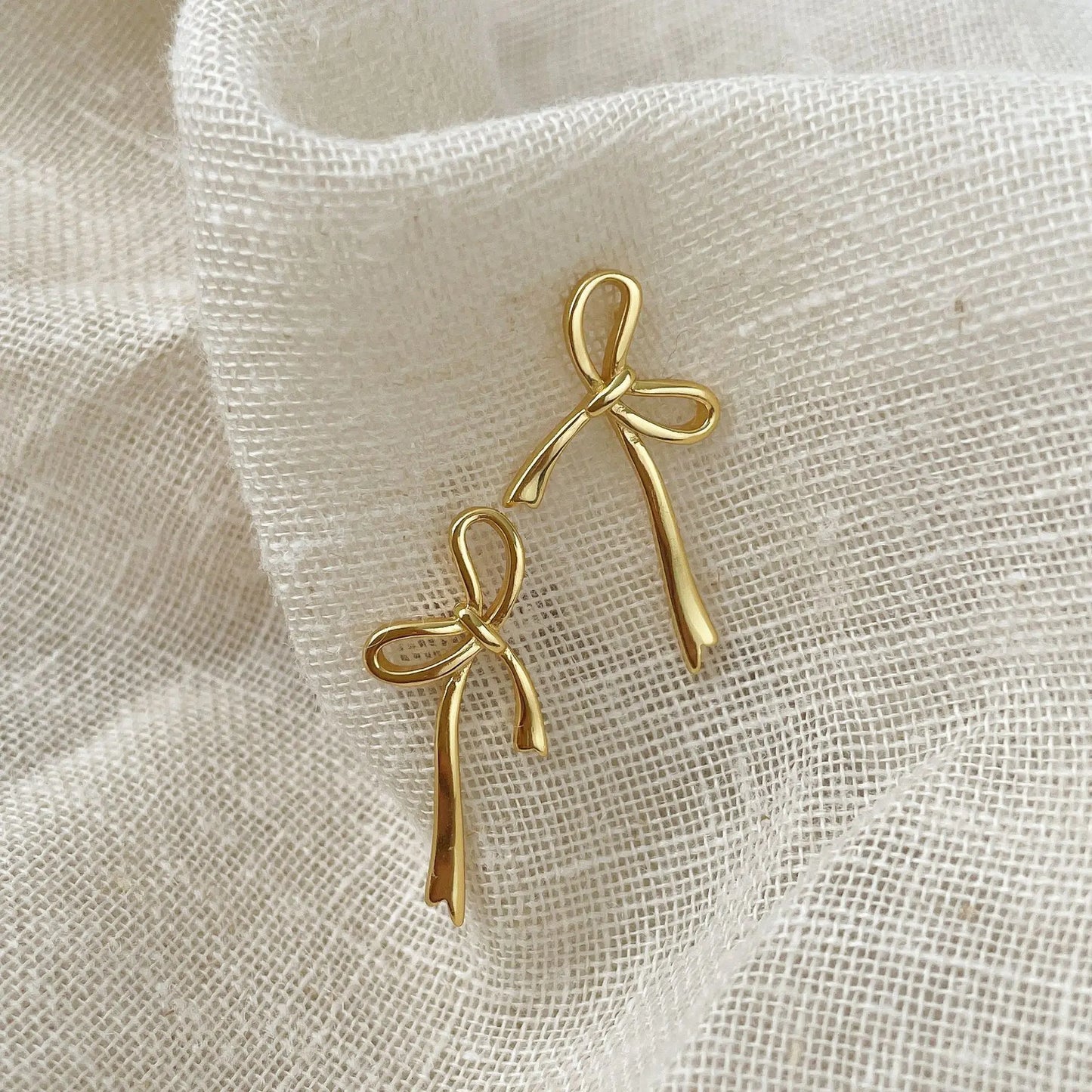 Elegant Silver/Gold Bow Earrings